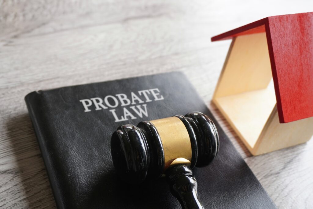 Toy house, gavel and text PROBATE LAW. Waterbury Divorce and Estate Attorneys